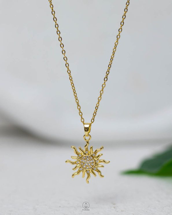 small gold sun shine struas necklace